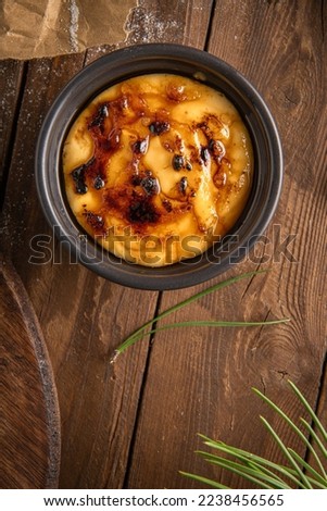 Similar – Image, Stock Photo Cream brulee on dark wood