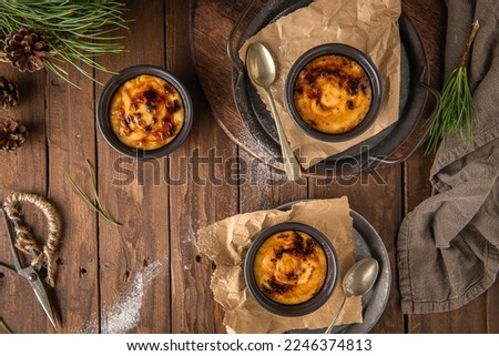 Similar – Image, Stock Photo Cream brulee on dark wood