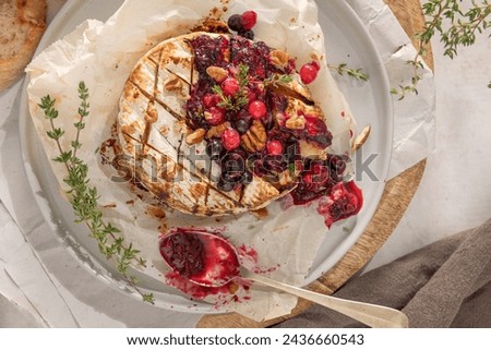 Image, Stock Photo Baked camembert served on wooden table