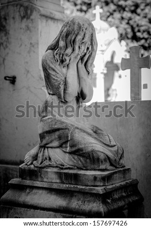 grave stone crying girl black and white