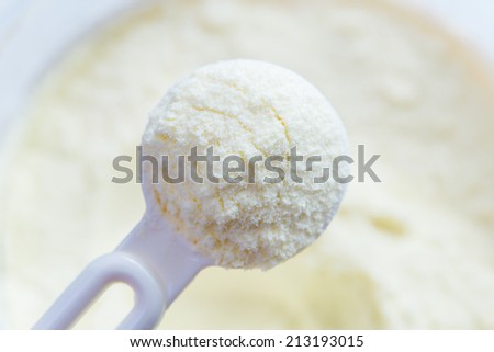 Powdered milk with spoon for baby