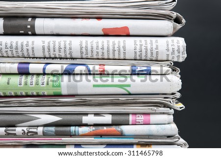 Newspapers folded and stacked