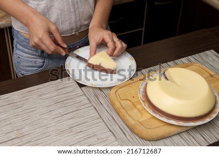 Girl cuts jelly cake.