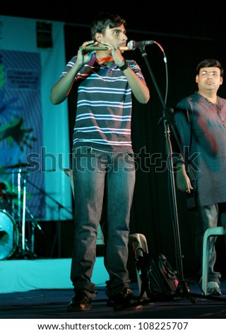 HYDERABAD,AP,INDIA-JUNE 21:Lalit and Nagaraju Perform indian fusion on flute at Alliance Francaise, Goethe Zentrum and HWM foundation World Music Day celebrations on June 21,2012 in Hyderabad,India.