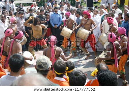 HYDERABAD,AP,INDIA-OCTOBER 27:Tribals perform dappu dance during inaguration of four-day Kalarchana event by Bharateeyam on October27,2012 in Hyderabad,India. Event promoting culture and tradtions.