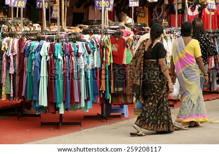 HYDERABAD,INDIA-JANUARY 18:Indian visitors shopping in numaish an annual consumer exhibition happening since  1938 on January 18,2015 in Hyderabad,India.Happens for 46 days in 23 acre venue.