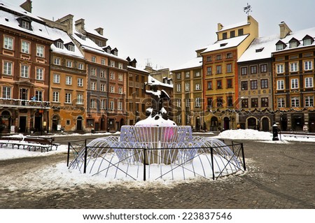 WARSAW, POLAND - JANUARY 17, 2013: Old town of Warsaw city in winter. After Christmas and New Year celebration, the town still has decorations in places.