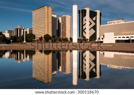 BRASILIA, BRAZIL - JUNE 6, 2015: South Banking Sector buildings reflected in water. All the buildings of the complex are own by national banks of Brazil.