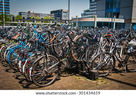 Eindhoven, Netherlands - June 8, 2013: Bicycle parking in Eindhoven Central Station. Bicycles are popular way to get around for the Dutch.