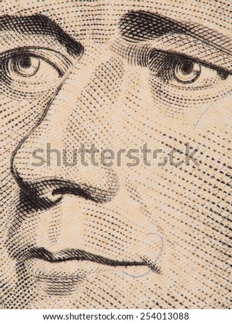 Alexander Hamilton face extreme macro on US 10 dollar bill, united states money closeup, 2013 series