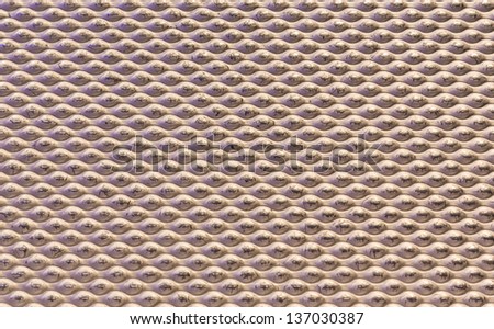 A Metal Background with  Oval Tread Pattern