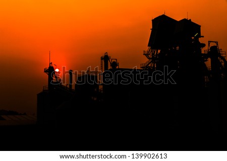 lime industry, silhouettes as against a background of sunset