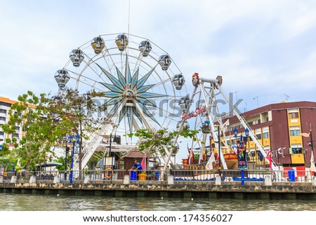 MALACCA, MALAYSIA - DECEMBER 23: Malacca eye on the banks of Melaka river on Dec 23, 2013 in Malacca, Malaysia. Malacca has been listed as a UNESCO World Heritage Site since 7 July 2008.