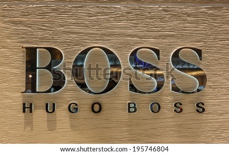 BANGKOK- MAY 4 : Hugo Boss logo at Suvanaphumi Airport, Bangkok on May 4, 14. It is a German luxury fashion and style house based in Metzingen, Germany. It is named after its founder, Hugo Boss.