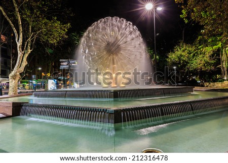 SYDNEY - MAY 16: Night shot of fountain at King Crooss on May 16, 14 in Sydney. King Cross is known as Sydney\'s red-light district, and is reputed to be home to organised crime groups.