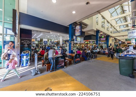 SYDNEY - MAY 16: People shop at Sydney Fish Market on May 16, 2014 in Sydney. It is the world\'s 3rd largest fish market, established in 1945 by the government and was privatized in 1994.