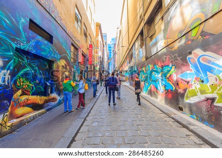 MELBOURNE, AUSTRALIA - MAR 19: Girl Graffiti at Hosier Lane on Mar 19, 2015 in Melbourne. It\'s one of the tourist attraction which is the ever-changing graffiti on the walls of Hosier Lane.