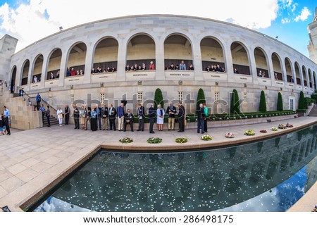 CANBERRA, AUSTRALIA - MAR 25: People attain Last Post Ceremony at Australian War Memorial on Mar 25, 2015 in Canberra. The ceremony conduct at the end of each day, commencing at 4.55 pm AEST.
