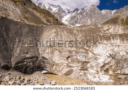 Similar – Foto Bild Massiver, mit Asche bedeckter Gletscher in vulkanischem Bergland