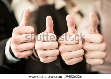Group of hands with thumbs up expressing positivity.Asian