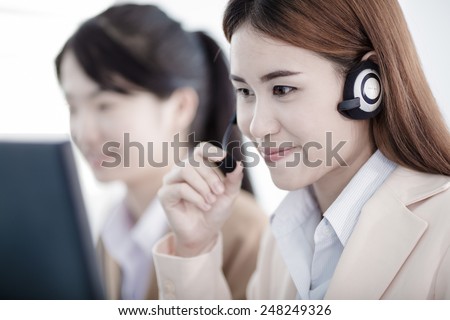 Asian women call center with phone headset