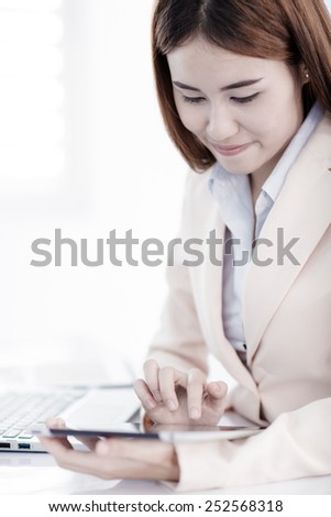 young asian businesswoman working in office