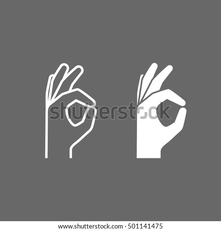 OK hand sign on a light background