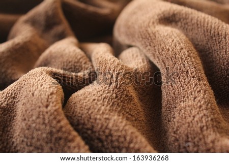 Rumpled brown fleece blanket