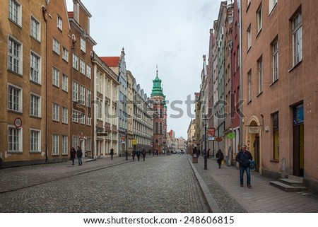 GDANSK, POLAND - JANUARY 15 2015 : Tourists and locals walking on streets in historical center of Gdansk city, Poland