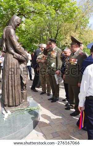 Veterans salute the monument dedicated to the children of besieged Leningrad, May 8, 2015