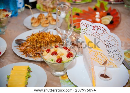 Festive well-laid table with food and drink