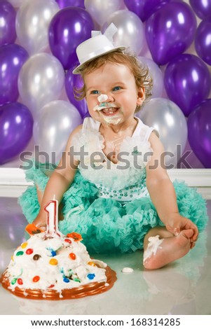 Happy little birthday girl, stained cake