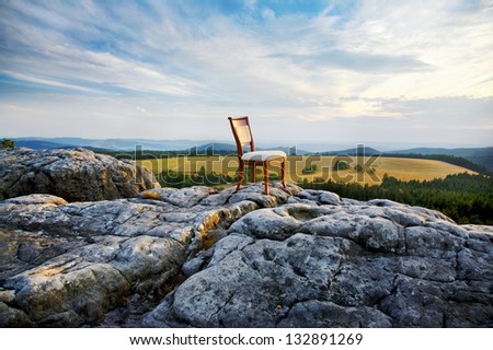 chair on top of a mountain