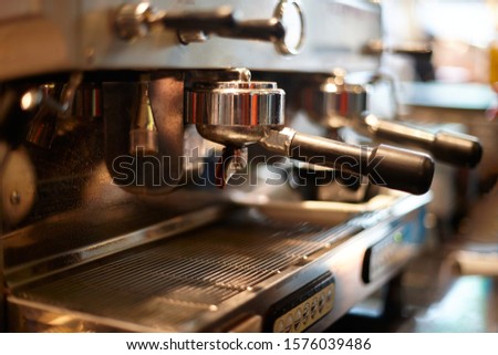 Making coffee in a professional coffee machine in a coffee shop  ストックフォト © 
