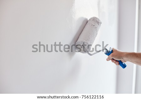 Similar – Image, Stock Photo Renovation concept. Male worker plastering a wall using a long spatula