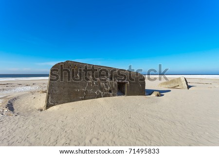 Bunker on a Danish beach. Fortification by the North Sea coast from world war 2