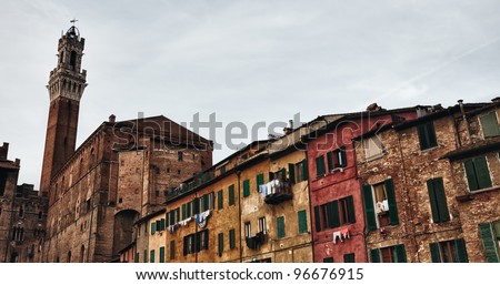 Palazzo Publico and Piazza del Campo in Siena, Italy . This historic center of Siena is a UNESCO World Heritage Site.