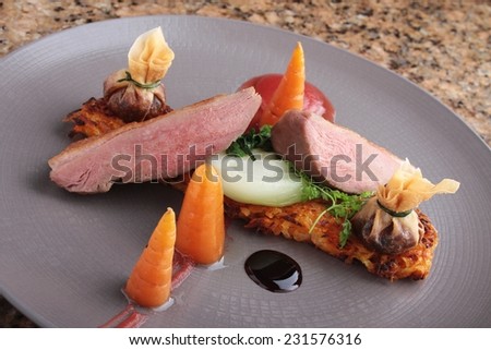 pan fried duck breast plated meal