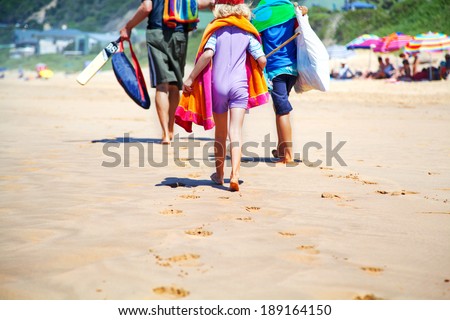 family going to the beach