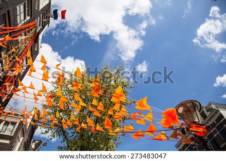 The Netherlands flag and decorations on King\'s day in Amsterdam