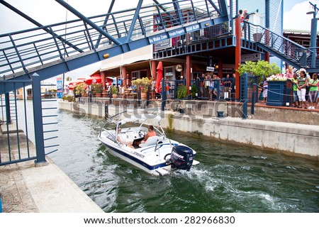 KNYSNA - DECEMBER 28: Knysna Waterfront on August 10, 2014 in Knysna, Western Cape Province, South Africa. The waterfront of Knysna is a popular tourist attraction with shops and restaurants