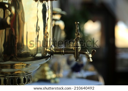 Samovar, old copper kettle in the cafe, vintage