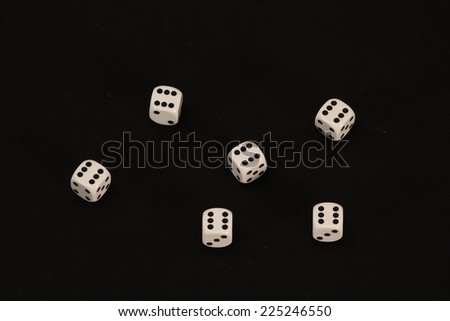 Playing cubes, white dices on black background, Good Luck / good luck in new year  concept