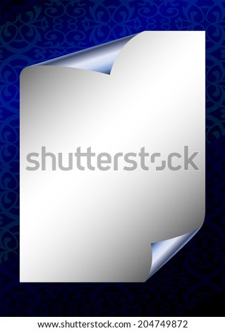 Vertical backdrop. Sheet of silver paper with rolled edges on dark blue patterned background. Paper for notes.