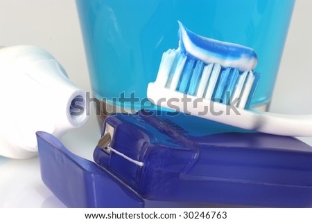 Dental care products on bright background