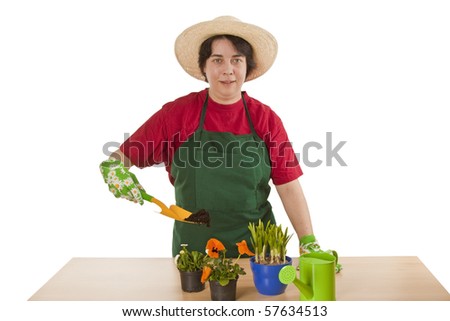 Woman gardener with garden tool isolated on white background.