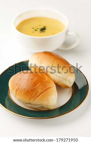 potage soup and a bread roll