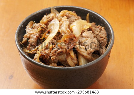 donburi, pork rice bowl, bowl of rice with food on top