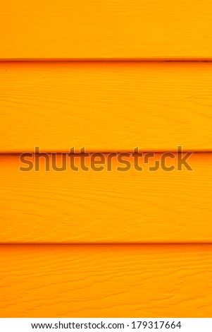 Wall make from wood paint orange colour