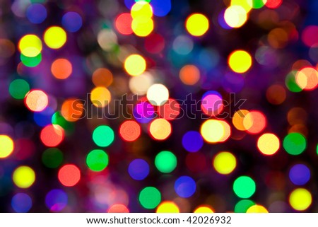 Christmas holiday green background with glossy tinsel